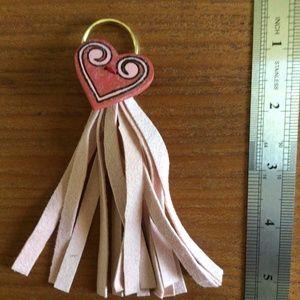 Pink faux suede tassel with wood heart bling